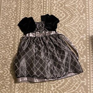 Elegant Black and Silver Dress with Bow